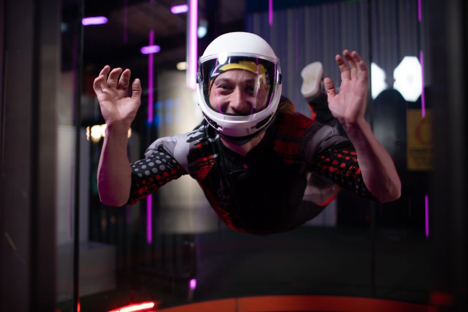 adult enjoying Urban Air's indoor wind tunnel skydiving