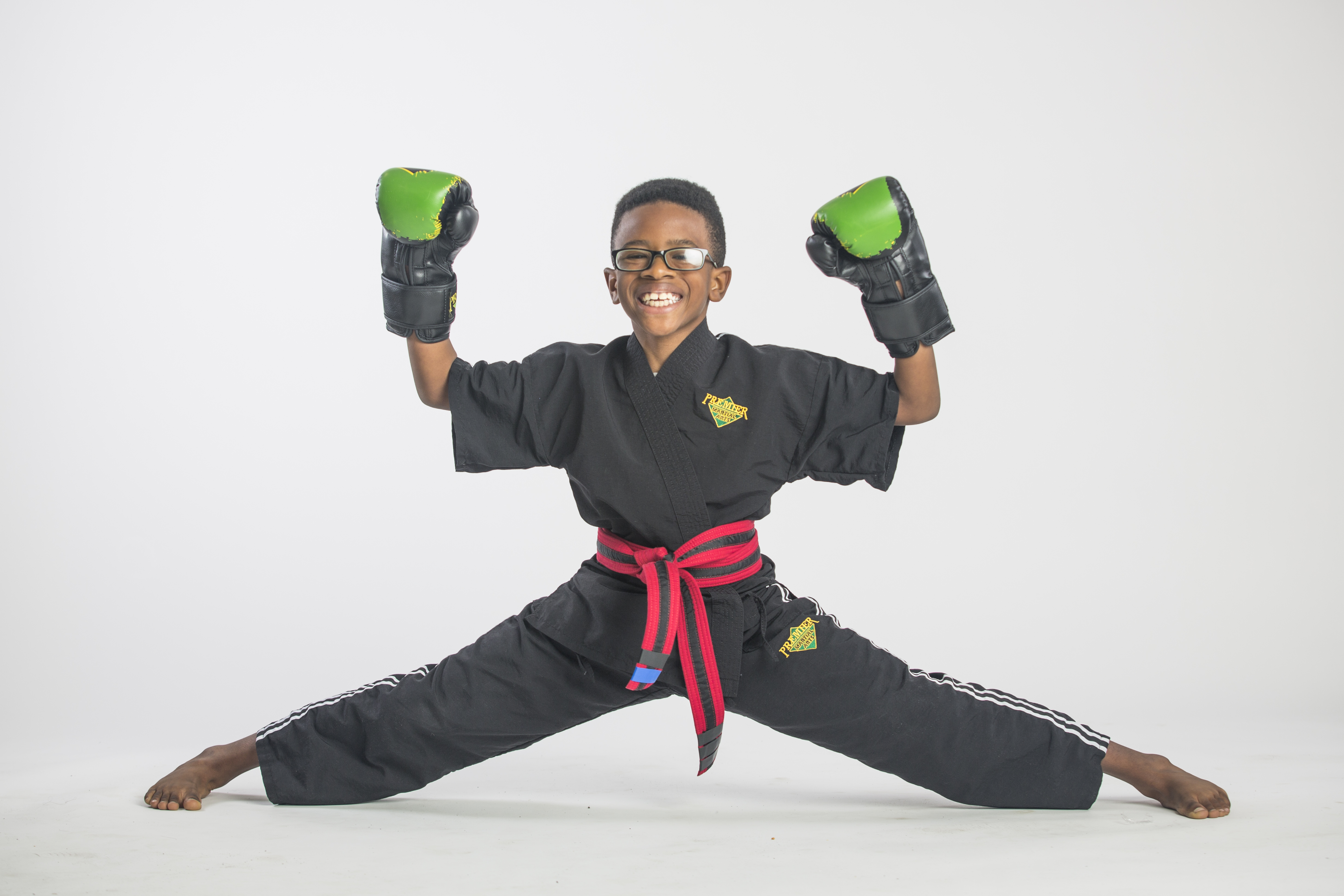 proud boy in his karate outfit