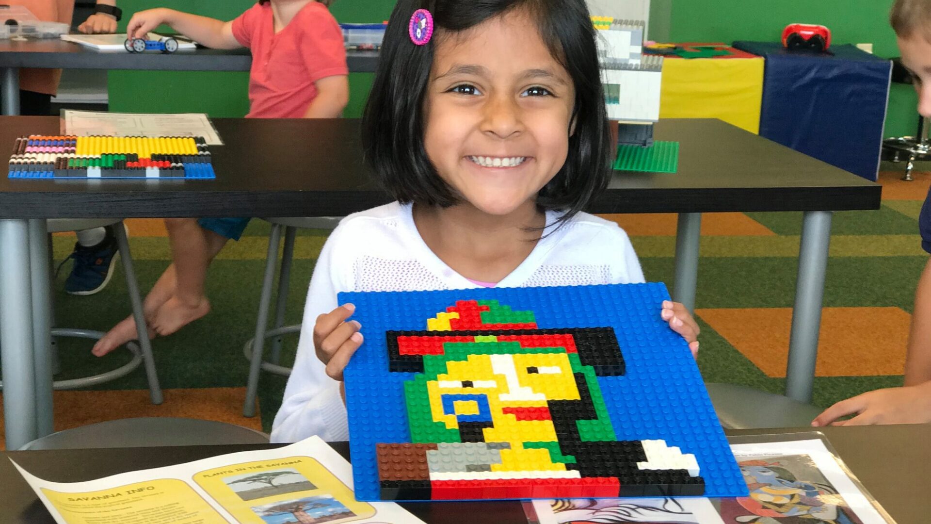 girl with her snapology brick creation