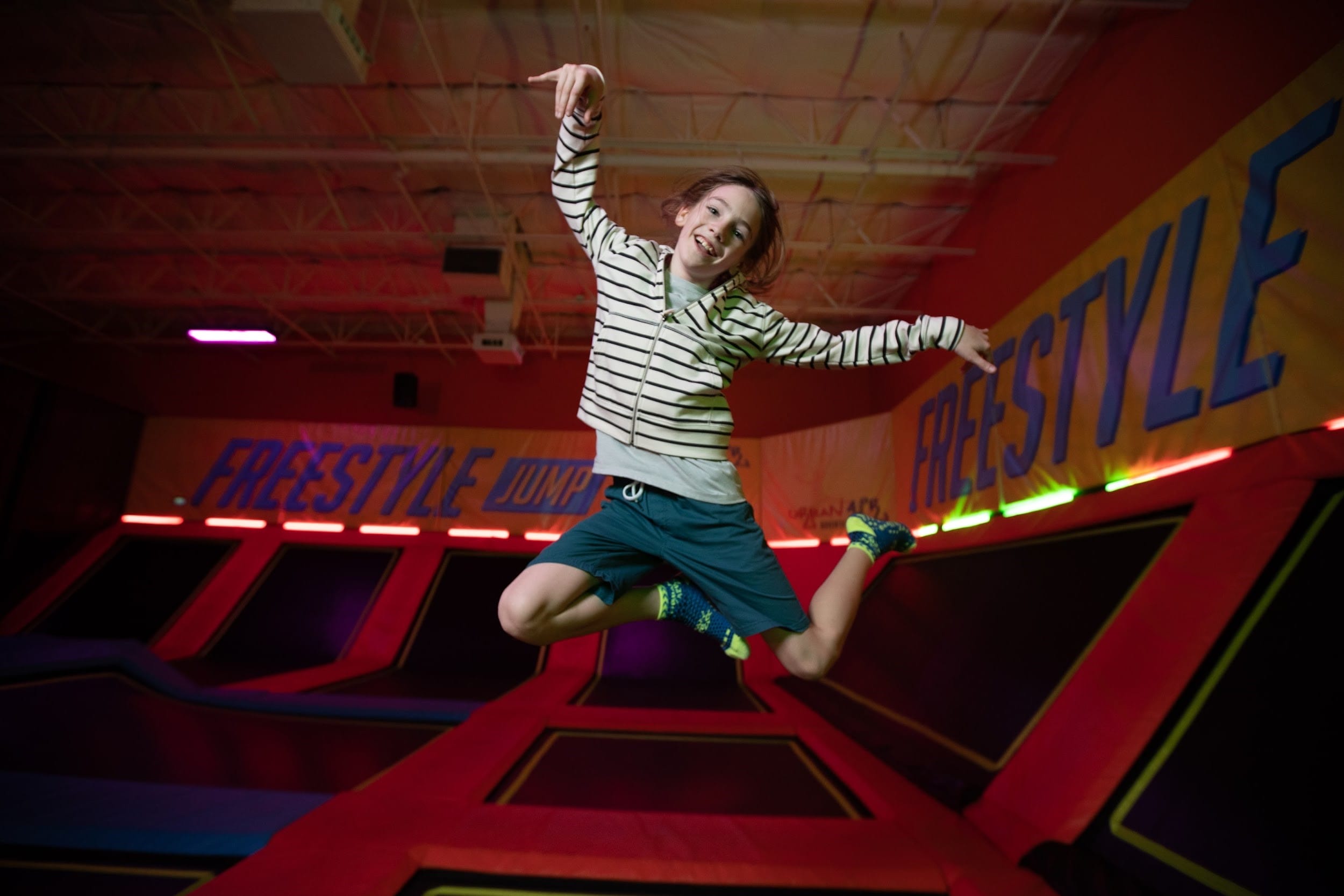 Kid jumpping on trampoline at Urban Air